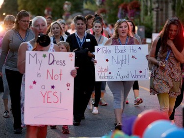 About 40 people came out for the Lanark Take Back the Night March Wednesday (Sept. 21, 2016) in Carleton Place.  Although the event is primarily focused on violence against women, amongst the speakers was Catherine Cameron, whose husband and former councillor, Bernard Cameron, was killed in February by their daughter's ex partner.  Before the march, 19 roses (including one for Bernard) were dropped into the Mississippi River in honour of women who had been killed in the area, including the three women murdered near Wilno last year on Sept. 22, 2015. Julie Oliver/Postmedia