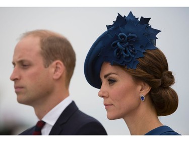 Catherine the Duchess of Cambridge (L) and Prince William the Duke of Cambridge speak to First Nations elders as they arrive at the Legislative Assembly in Victoria, British Columbia on September 24, 2016. The prince and his wife first visited Canada five years ago. This time they will take in the natural beauty of Canada's Pacific coast, heading as far north as the rugged Yukon territory, and will also meet with indigenous people. /