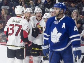 Ottawa Senators, from left to right, Casey Bailey, Guillaume Lepine, Andreas Englund, Phil Varone, and Nick Paul celebrate a goal in front of Toronto Maple Leafs' Nazem Kadri during second period preseason NHL hockey action, in Halifax on Monday, September 26, 2016.