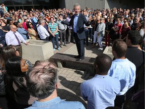 Canada's chief statistician, Wayne R. Smith, talks to co-workers gathered at the Jean Talon Building as he says his goodbyes on Friday, Sept. 16, 2016.