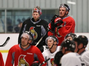 Craig Anderson (L) and Dion Phaneuf of the Ottawa Senators during the first day of training camp at the Bell Sensplex.