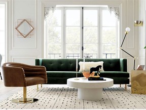 Saturated pops of colour is a top autumn trend. The forest green sofa with brass legs is from cb2.com.