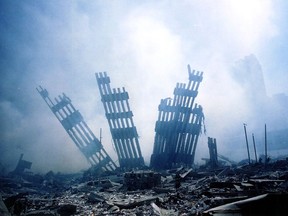 (FILES) This file photo taken on September 11, 2001 shows  the rubble of the World Trade Center smouldering following the collapse of the towers. The Twin Towers of the World Trade Center which were struck by hijacked airplanes collapsed on that day claiming 2,753 lives. September 6, 2016 marks the fifteenth anniversary of the event. /