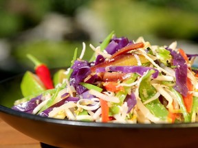 The Coconut Vegetable Slaw from Washington, D.C.'s Bad Saint includes cabbage, carrots, snow peas, fresh coconut and slivers of lime leaves.