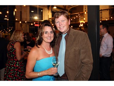 From left, Alison Fowler and Andrew King, both local artists, were among the hundreds to attend the 25th anniversary party of Thyme & Again Creative Catering and Take Home Food Shop, held at the Horticulture Building on Friday, September 9, 2016. (Caroline Phillips / Ottawa Citizen)