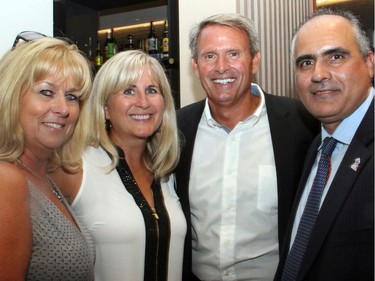 From left, Jane DiRaimo with Margaret McCarney and Ottawa Police Insp. Pat Flanagan and Osgoode Ward Coun. George Darouze on Wednesday, September 7, 2016, at the grand opening party for the new Andaz luxury boutique hotel in the ByWard Market.