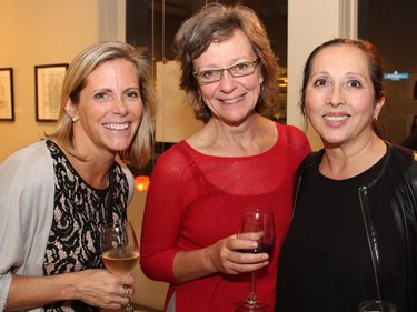 From left, Jennifer Campbell, editor of Diplomat magazine, with Cube Gallery co-owner and journalist Becky Rynor and businesswoman Vivianna Sigurdson, owner of Vivianna Day Spa, at PAL Ottawaís benefit soirée, held at Cube Gallery on Wellington Street West on Thursday, September 29, 2016.