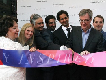 From left, Romina Malhotra, Louise Malhotra, Bill Malhotra, Neil Malhotra and Shawn Malhotra from family-owned Claridge Homes with Mayor Jim Watson and Rideau-Vanier Ward Coun. Mathieu Fleury at the ribbon cutting ceremony and grand opening party for the new Andaz luxury boutique hotel in the ByWard Market, held Wednesday, September 7, 2016.