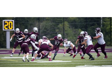 The Gee-Gees' Kalem Beaver finds a hole against the McMaster Marauders.