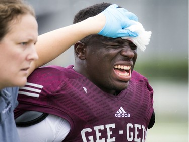 The Gee-Gees' Shako Dimanche leaves the field injured.