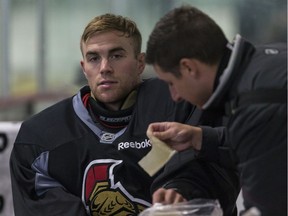 Senators goaltender Matt O'Connor, seen getting an equipment adjustment earlier this week, skated to the bench favouring his left leg on Friday after former Senators prospect Tobias Lindberg collided with him.
