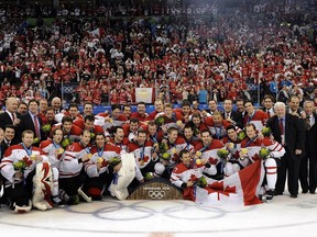 Sarnia's Doug Armstrong was an architect of the men's Olympic hockey team that won the gold medal at the Vancouver Winter Olympics. He posed with the team for this iconic photo at GM Place in Vancouver  on  Feb. 28, 2010.