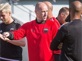 Head coach Paul Dalglish talks to the players as the Ottawa Fury practice in advance of their next game on Saturday night at TD Place.