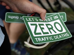 Is it possible to lessen traffic fatalities with both trucks and cyclists on the road? (Photo: Darren Brown/Ottawa Citizen) Assignment 124656