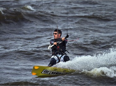 High winds brought the kiteboarders and windsurfers out to the Ottawa River just out from Britannia Beach Sunday September 11, 2016.   Ashley Fraser / Postmedia