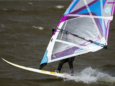 High winds brought the kiteboarders and windsurfers out to the Ottawa River just out from Britannia Beach Sunday September 11, 2016.   Ashley Fraser / Postmedia