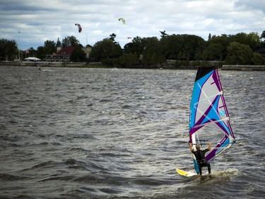 High winds brought the kiteboarders and windsurfers out to the Ottawa River just out from Britannia Beach Sunday September 11, 2016.   Ashley Fraser / Postmedia