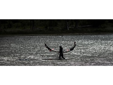 High winds brought the kiteboarders and windsurfers out to the Ottawa River just out from Britannia Beach Sunday September 11, 2016.   Ashley Fraser / Postmedia