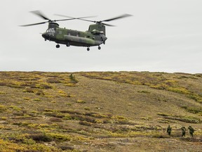 A CH-147 Chinook helicopter from 450 Tactical Helicopter Squadron takes off after dropping off members of 12 Régiment blindé du Canada to a potential 1950 US aircraft crash site to conduct a new search, in the vicinity of Haines junction, Yukon during Operation NANOOK 2016.

Photo: MCpl Mathieu Gaudreault, Canadian Forces Combat Camera
IS09-2016-0032-003