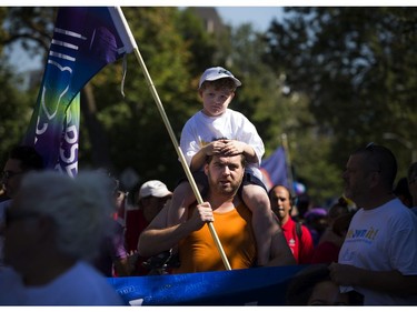 Jay Timms and his son five year old Noah Timms took part in the annual Ottawa Labour Day Parade to celebrate working people Monday September 5, 2016.