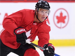 Team Canada's Jonathan Toews makes a pass during practice in Ottawa on Tuesday, Sept. 6, 2016, in preparation for the World Cup of Hockey.
