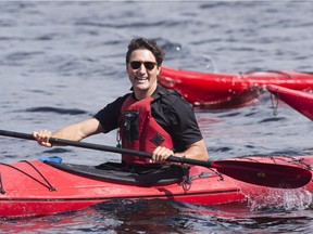 Prime Minister Justin Trudeau paddles a kayak on the Saguenay River, Friday, August 26, 2016 in Saguenay Que.