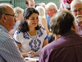 Minister of Democratic Institutions and Peterborough-Kawartha MP Maryam Monsef takes part in a group conversation at a town hall meeting on electoral reform at the Mount Community Centre on Tuesday, September 6, 2016. Monsef is on a seven-week, cross-country tour gathering input on democratic reform. Jessica Nyznik/Peterborough Examiner/Postmedia Network