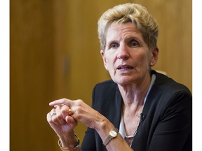 Ontario Premier Kathleen Wynne takes part in an Ottawa Citizen editorial board meeting in Ottawa Friday, Sept. 16, 2016.