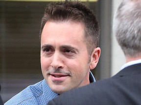 Ottawa police Const. Jason Bond leaves his disciplinary hearing on Thursday.