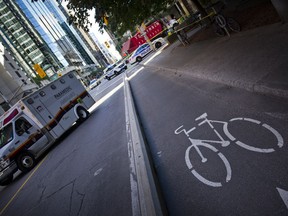 Ottawa Police are investigating the death of a cyclist after a collision with a truck at the corner of Laurier and Lyon Street Thursday September 1, 2016.