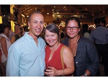 Parkdale Food Centre board members Len Fardella (chair) and Lynda Hansen and volunteer Jo-Ann Laverty from its 13 Muesli Project, were out to support fellow board member, Sheila Whyte, owner of Thyme & Again Creative Catering and Take Home Food Shop, at a party she threw Friday, September 9, 2016, to celebrate the 25th anniversary of her business. (Caroline Phillips / Ottawa Citizen)