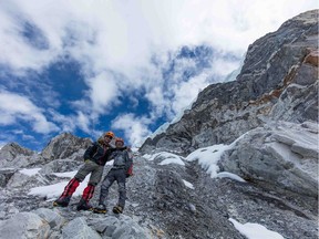 Elia Saikaly and Pasang Kaji Sherpa on the side of Hillary Peak, Nepal.