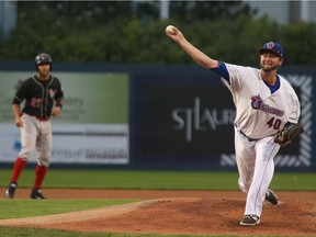 Pitcher Austin Chrismon of the Ottawa Champions throws against the New Jersey Jackals at the Raymond Chabot Grant Thornton Park in Ottawa, September 07, 2016.