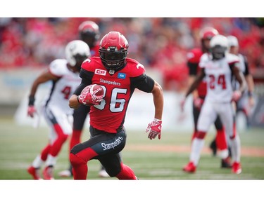 The Calgary Stampeders' Anthony Parker runs the ball against the Ottawa Redblacks.