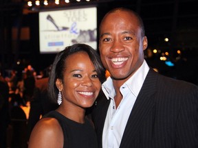 Redblacks quarterback Henry Burris and his wife, Nicole, seen at a function in 2015, continue to wait on processing of applications to become permanent residents of Canada. Burris, now 41, has played in the CFL for all but two years since 1997, and he and Nicole have lived in Canada full-time since 2005.