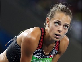 Melissa Bishop of Canada looks up at her time after running the women's 800m semifinal at the Rio 2016 Olympics in Rio de Janeiro, August 18, 2016.