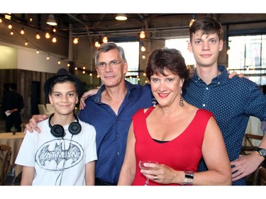 Sheila Whyte, owner of Thyme & Again Creative Catering and Take Home Food Shop, was joined by her husband, Clayton Kennedy, and their sons, Adam Kennedy, 12, and Teagan Kennedy, 17, at a 25th anniversary party she threw at the Horticulture Building at Lansdowne on Friday, September 9, 2016. (Caroline Phillips / Ottawa Citizen)