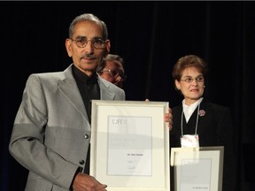 A dozen years after whistleblowers Margaret Haydon and Shiv Chopra were fired by Health Canada for alleged insubordination, a tribunal has ordered the reinstatement of one and voided a 20-day suspension imposed on the other. Here, Haydon and Chopra are shown in a photo from 2000.