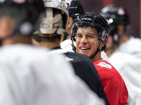Sidney Crosby shares a laugh with fellow players as Team Canada practices at Canadian Tire Centre in preparation for the World Cup of Hockey Tournament.