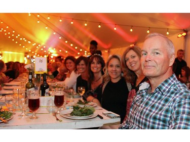 Supporter Ken Hoppner of Morley Hoppner Group and his friends dined elbow-to-elbow beneath a beautiful party tent during the 40 Years of Love anniversary gala.