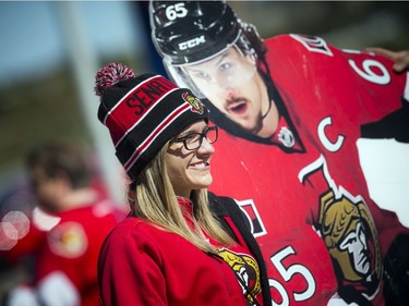 Tasha Bastien poses for a photo with the cardboard cutout of Erik Karlsson during the annual Senators Fanfest that took place Sunday September 25, 2016 at the Canadian Tire Centre.