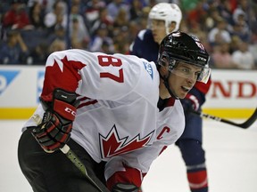 Team Canada' Sidney Crosby, seen Friday night against Team USA,  gets the night off in Ottawa after a physical first meeting.