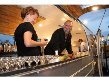 That's Don Monet, co-owner of Cube Gallery, hanging out in the Cellar 82 airstream mobile bar and lounge during the 25th anniversary party that took place at the Horticulture Building on Friday, September 9, 2016, to celebrate the 25th anniversary of Sheila Whyte's successful business, Thyme & Again Creative Catering and Take Home Shop. (Caroline Phillips / Ottawa Citizen)