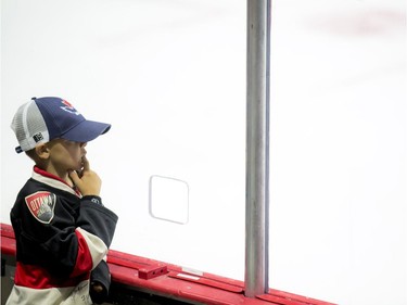 The annual Senators Fanfest took place Sunday September 25, 2016 at the Canadian Tire Centre including an intrasquad game where this young fan couldn't take his eyes off the ice.    Ashley Fraser / Postmedia