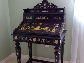 The rare ebony and ivory desk dates back to the 1880s and is worth at least an estimated $1,450. 

0917 home antiques