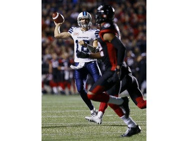 Toronto Argonauts quarterback Dan LeFevour (18) throws a pass against the Ottawa Redblacks.