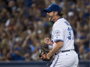 Toronto Blue Jays relief pitcher Jason Grilli (37) reacts after ending the inning against the Tampa Bay Rays during eighth inning AL baseball action in Toronto on Monday, September 12, 2016.