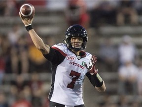 Ottawa Redblacks quarterback Trevor Harris fires a pass during first quarter CFL football action against the Montreal Alouettes, in Montreal on Thursday, September 1, 2016.
