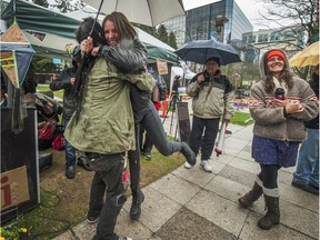 VANCOUVER, BC - APRIL 5, 2016, -  Hunger striker Kristin Henry gets hugs outside BC Hydro headquarters in Vancouver during a protest of the Site C dam. Hydro Protest in front of BC Hydro building on Dunsmiur street in Vancouver BC. April 5, 2016.  (Arlen Redekop / PNG photo) (story by Nick Eagland)  [PNG Merlin Archive] ORG XMIT: POS2016040515205474 Courtesy of Fairmont. Only to be used with Shari Kulha's Fairmont story in Luxury Living.