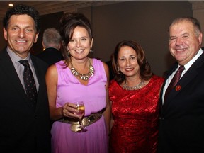 Well-known lawyer and charity auctioneer Lawrence Greenspon with his wife, Angela Lariviere, and Rina Filoso and her husband, Angelo Filoso, vice president of the Ottawa Fire Fighters Community Foundation, at the organization's 9th annual memorial dinner gala, held at the Sala San Marco on Thursday, September 8, 2016.